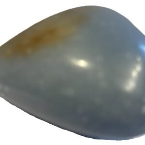 Smooth polished blue angelite carved heart crystal showing natural white mineral flecks on a white background